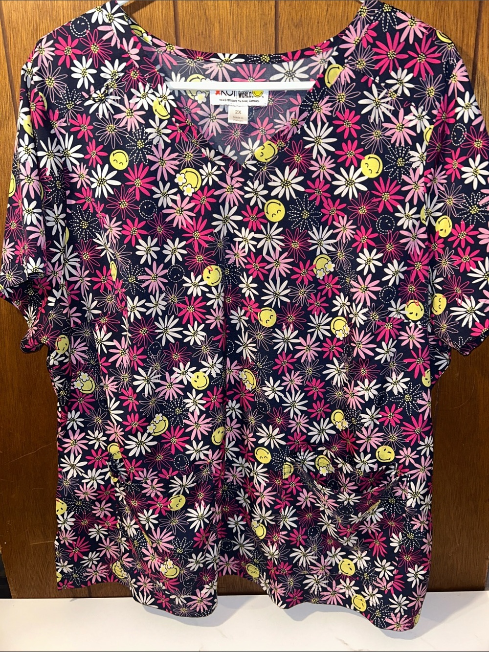 2/$25 koi | Navy Floral Scrub Top with Pink Daisies & Yellow Smiley Faces